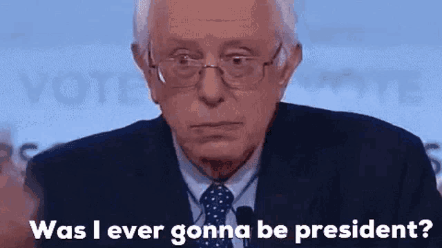 a man wearing glasses and a suit is giving a speech and says `` was i ever gonna be president ? ''