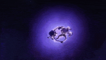two anime girls are holding hands in a circle in a purple light .