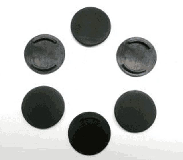 a bunch of different types of car keys are stacked on top of each other