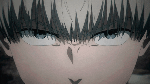 a close up of a person 's face with a very angry expression