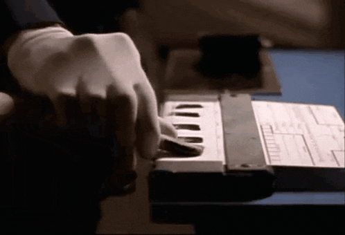 a close up of a person playing a keyboard