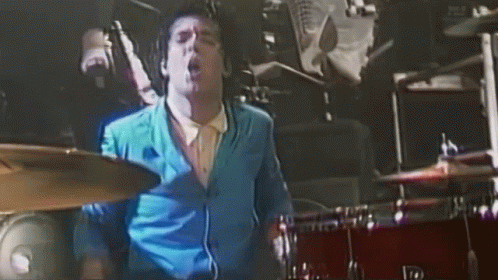 Spitting While Playing Drums Clem Burke GIF - Spitting While Playing Drums Clem Burke Blondie GIFs