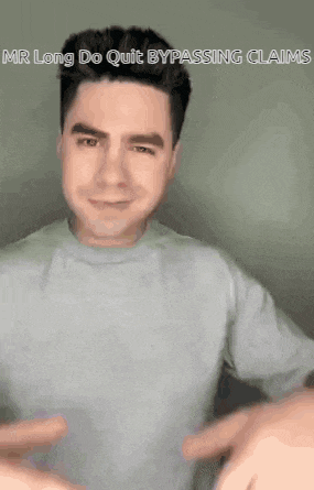 a man in a gray shirt is making a funny face and says `` mr long do quit bypass claims '' .