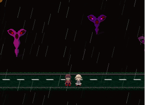 a couple of people standing on a street in the rain