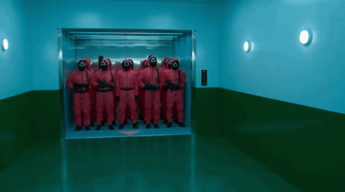 Squid Game Pink Soldiers GIF - Squid Game Pink Soldiers Lift GIFs