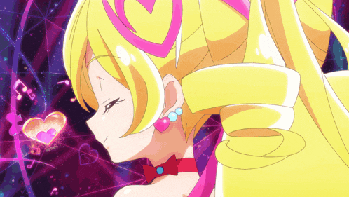 a close up of a girl with yellow hair and a red bow
