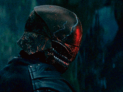 a man wearing a helmet with a red light on it