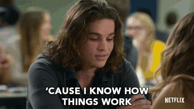 a young man with long hair says ' cause i know how things work '