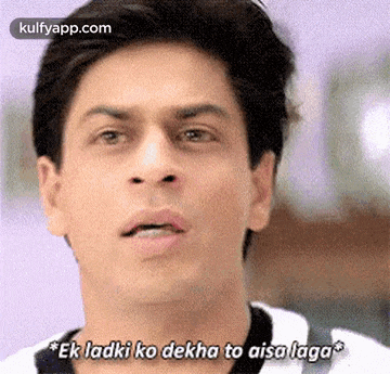 a close up of a man 's face with the words `` ek ladki ko dekha to aisa laga ''