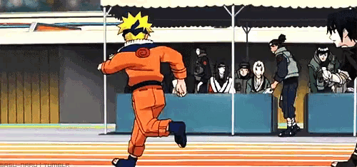 a cartoon character is running on a track in front of a group of people .
