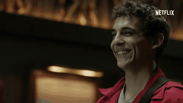 a man in a red jacket is smiling with netflix written on the bottom