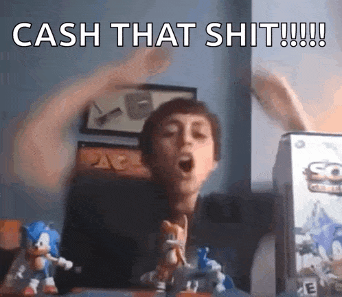 a man is sitting in front of a box of sonic the hedgehog toys and says cash that shit