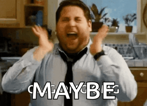 a man in a tie is screaming in a kitchen and says maybe