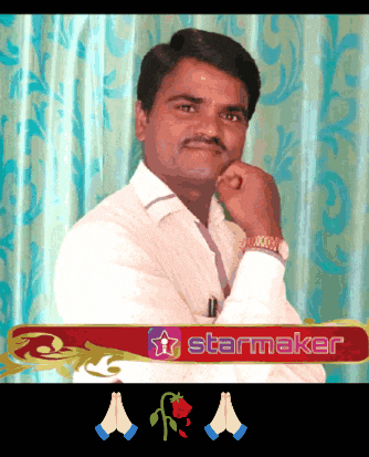 a man stands in front of a starmaker logo