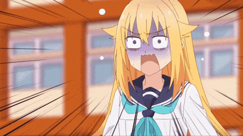 a girl with blonde hair and a blue bow tie is making a funny face