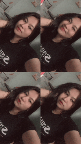 a woman wearing a black shirt that says 2 on it