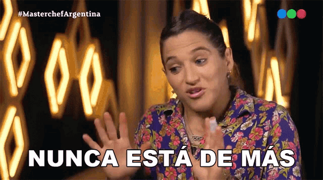a woman says " nunca esta de mas " in a foreign language