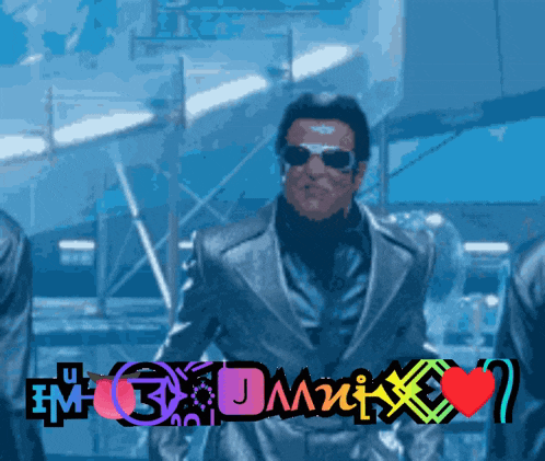 a man in a suit and sunglasses is standing in front of a sign that says damn