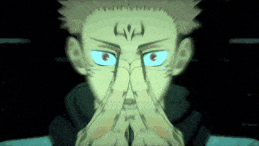 a close up of a person 's face with their hands on their face .