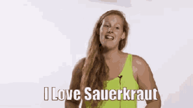 a woman says i love sauerkraut in a neon green tank top