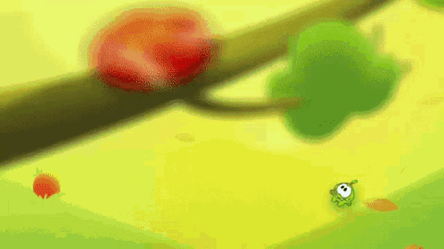 a cartoon worm is crawling on a tree branch next to an apple .