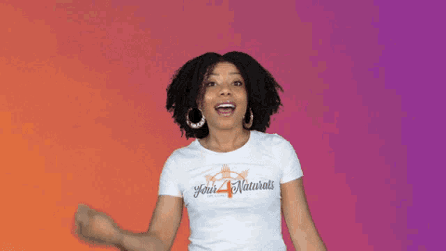 a woman wearing a white t-shirt that says four naturals