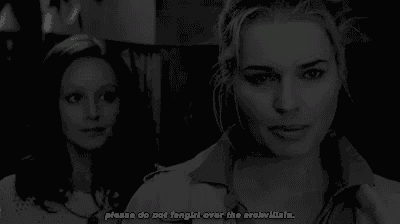 two women are standing next to each other and one of them is saying please do not fangirl over the archvillain