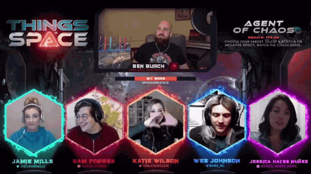 a group of people are sitting in front of a screen that says " things space "
