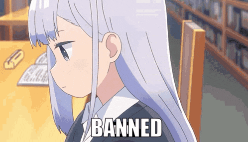 a girl with white hair is sitting at a table with the word banned written on the bottom