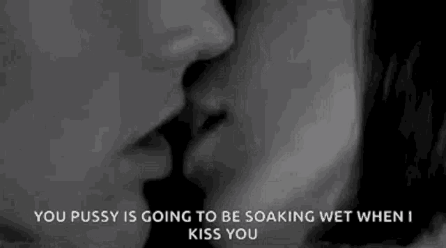 a man and woman are kissing in a black and white photo with a quote .