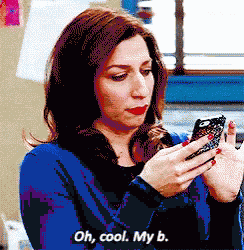 a pixelated image of a woman looking at her phone and saying oh cool my b