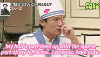 a man in a chef 's hat is talking about his left brow .