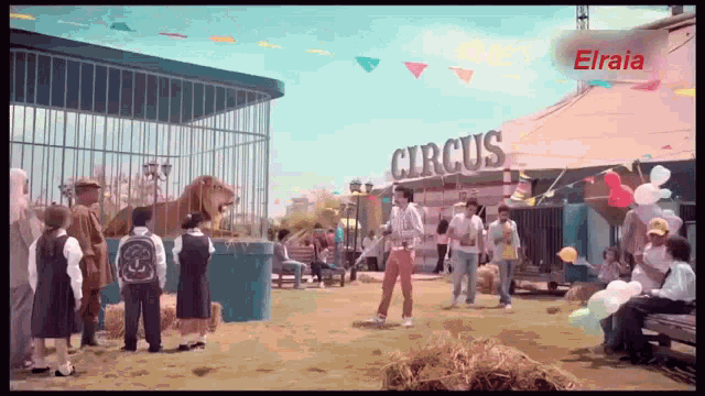 a group of people are gathered outside of a circus tent