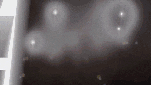 a black background with a few white circles in it
