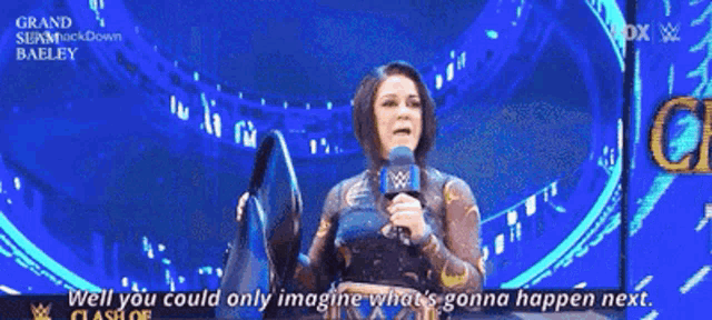 a woman holding a microphone says well you could only imagine what s gonna happen next