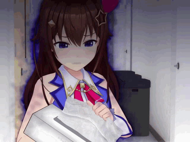 a girl with a star on her head is holding a box