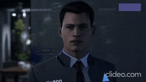 a man in a suit and tie is talking to another man in a video game with clideo.com at the bottom