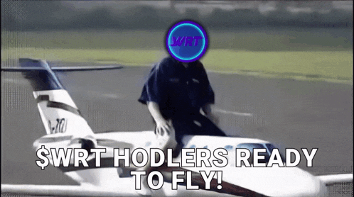 a man sitting on a small airplane with the words swrt hodlers ready to fly