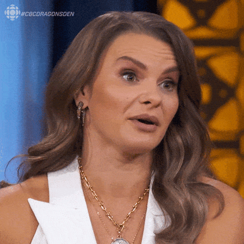 a woman with a surprised look on her face has #cbcdragonsden written on the bottom