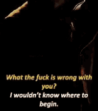 a man is standing in the dark with a quote that says what the fuck is wrong with you ?