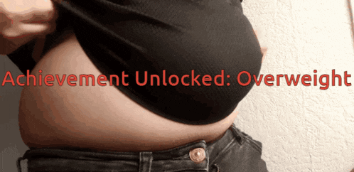a woman 's stomach is shown with the words achievement unlocked overweight written above it