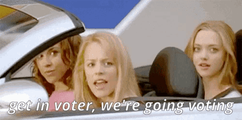 three women are sitting in a car with the words get in voter we 're going voting above them