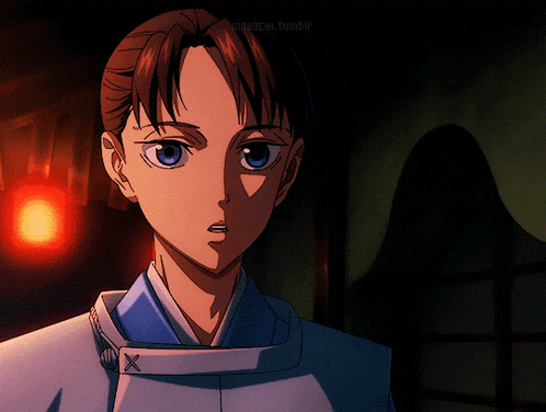 a close up of a person 's face with a red light behind them and a tumblr logo in the corner