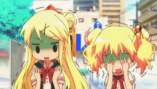 a girl with a k on her head is standing next to a girl with a green face