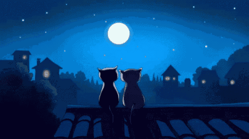 two cats sitting on a roof looking at a full moon