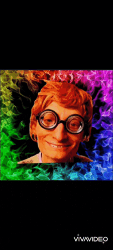 a picture of a man wearing glasses and a rainbow background with the words vivavideo at the bottom