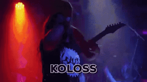 a person playing a guitar with the word koloss on the bottom right