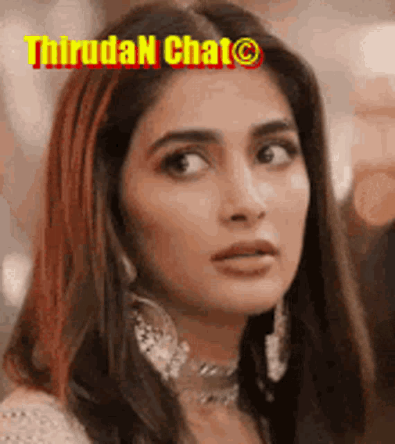 a close up of a woman 's face with the words thiruda n chat on the bottom .