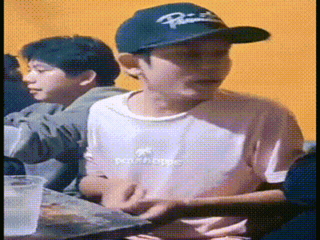 a person wearing a hat that says ralph lauren on it