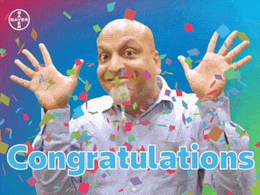 a man is surrounded by confetti and the words congratulations are on the bottom